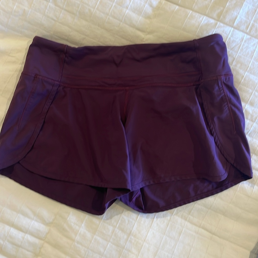 Speed Up Mid-Rise Lined Short 4"
Burgundy maroon color